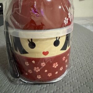 Red Kokeshi Doll Bento Box with Cherry Blossom Design